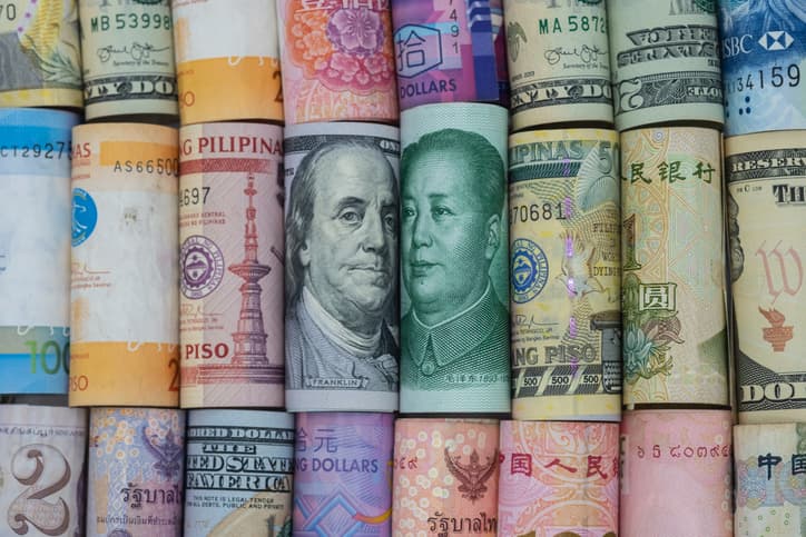 image of different currencies, focusing on USD and yuan