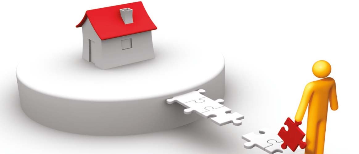 bridge jigsaw pieces white house red roof person