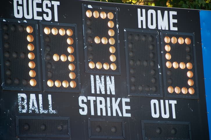 Baseball scoreboard shows 13 runs scored by away team in 3rd inning versus home team's 5 runs.