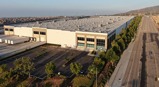 A photograph of an industrial building in Southern California owned by Alere Property Group.