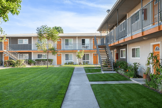 The outside facade and walkways of Villa Del Sol in Santa Ana, California.