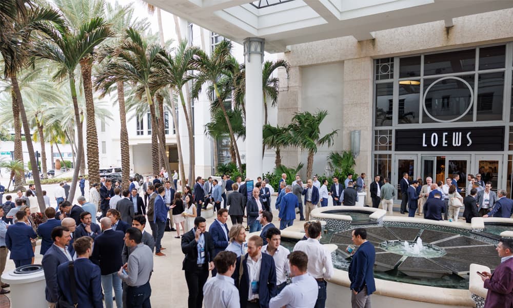 A crowd gathering outside Loews Hotel for CREFC Miami.