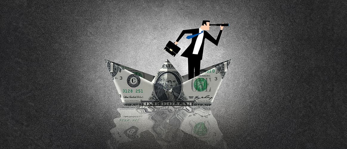 Man inside a boat made with a dollar