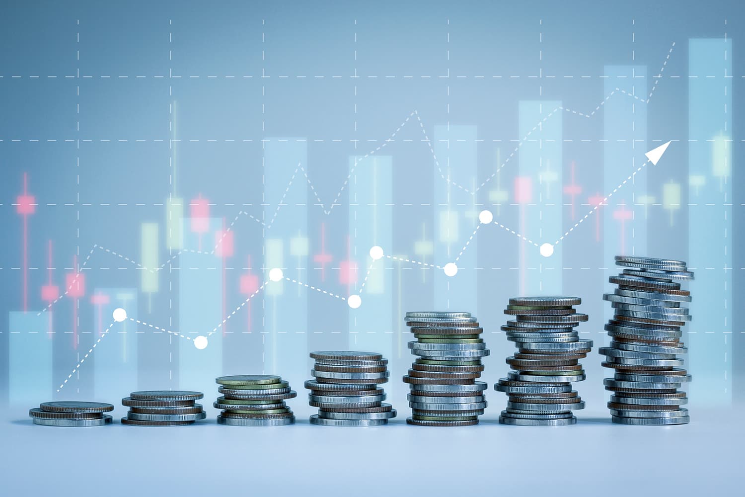 Image of stacks of coins in increasing order with faded statistics in the background.