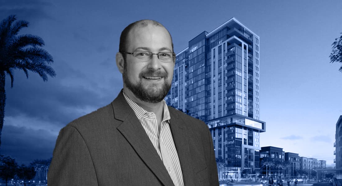 Mike Doty, senior director of originations at Nuveen Green Capital, in front of a rendering of Capella in Las Vegas, Nevada