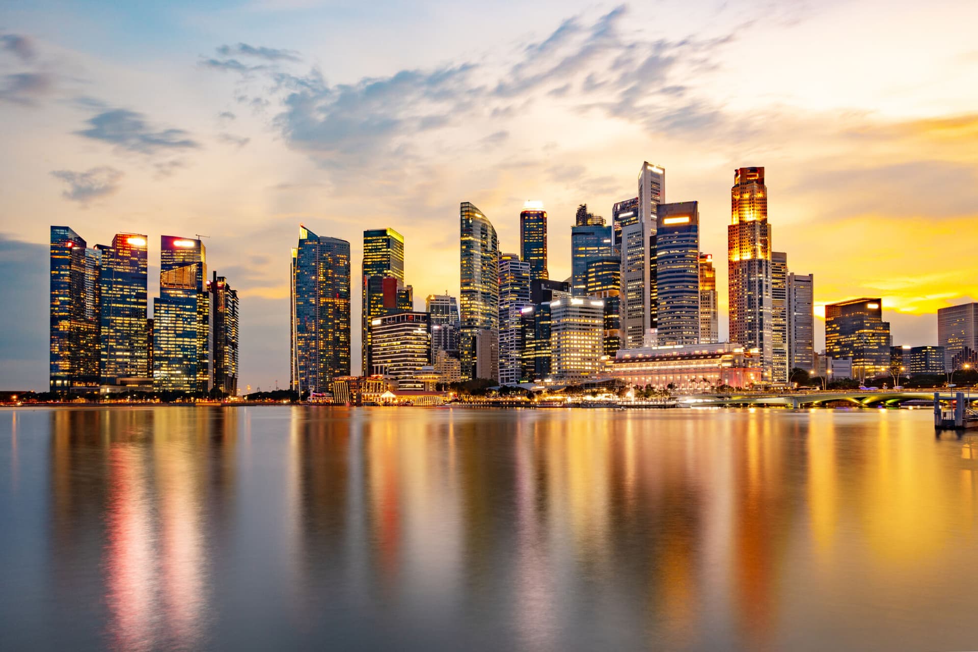 Moody Sky at Sunset with Reflection in Marina Bay, Long Exposure to Blur Water