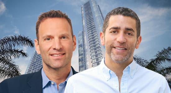 Slate Property Group's Daniel Ridloff and Martin Nussbaum in front of a Miami development rendering.