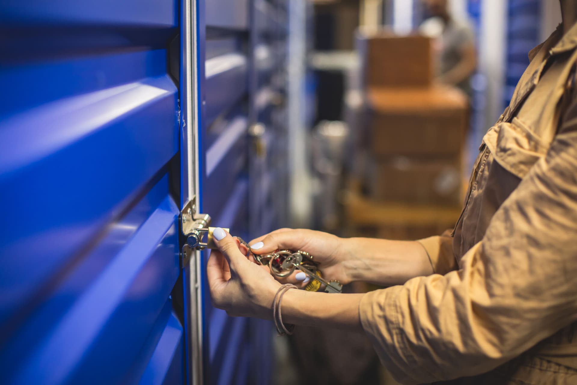 View of self storage warehouse, process of keeping and storing the goods and items in storage units, self-storage building, lock and key concept.