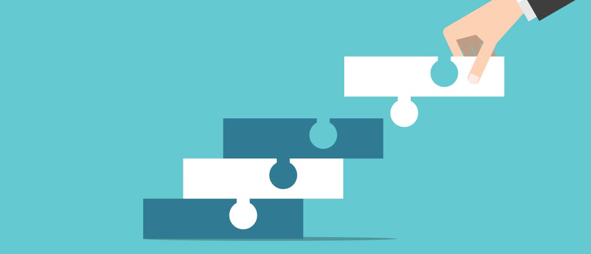 Graphic of a hand placing a puzzle piece into one piece that is connected to another piece, connecting to another.