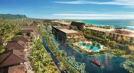 A photo of homes in Hawaii surrounding a river