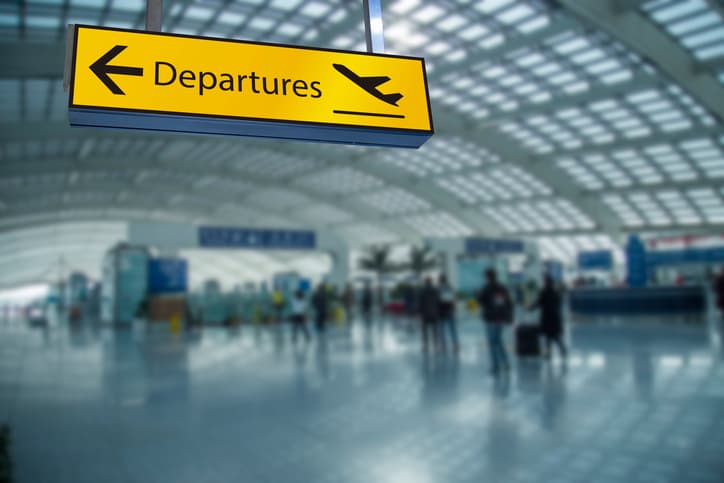 photo of departure sign at airport