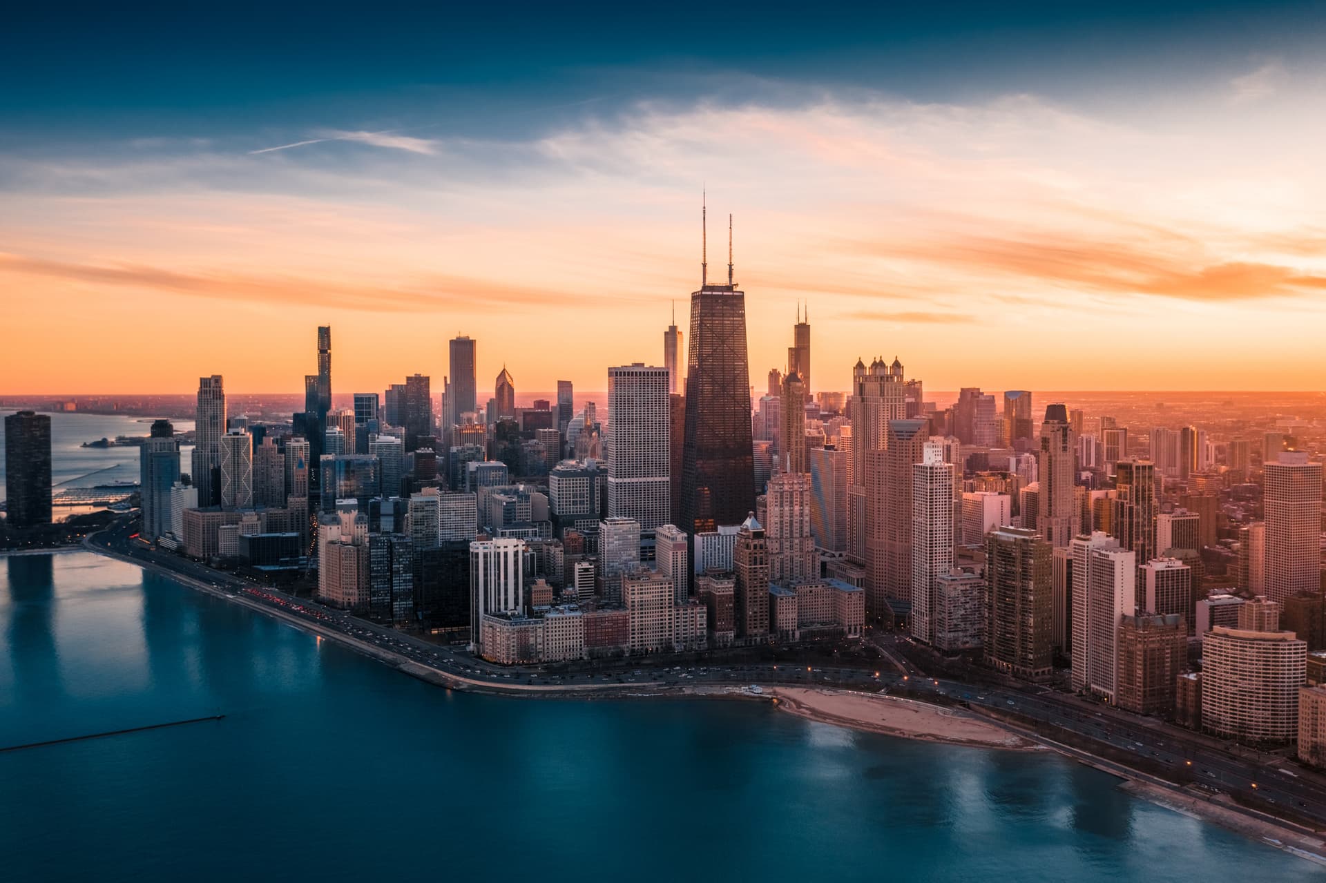 Photo of a dramatic sunset, featuring Downtown Chicago.