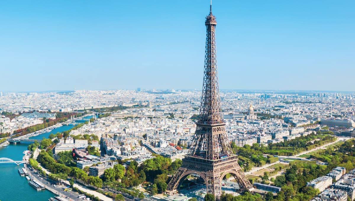 a view of Paris with the Eiffel tower in the foreground