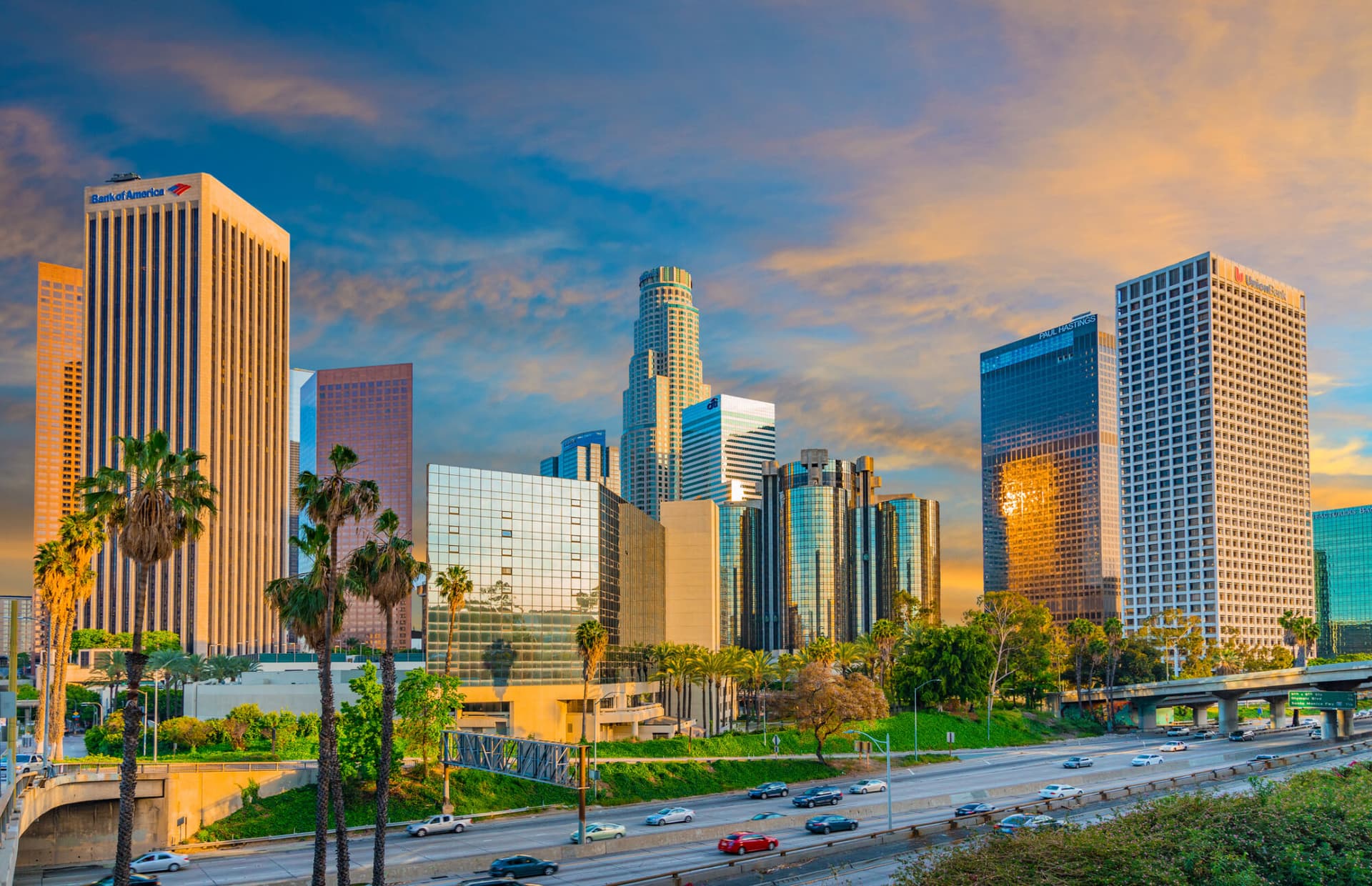Dusk light with dramatic clouds in downtown Los Angeles and freeway,California