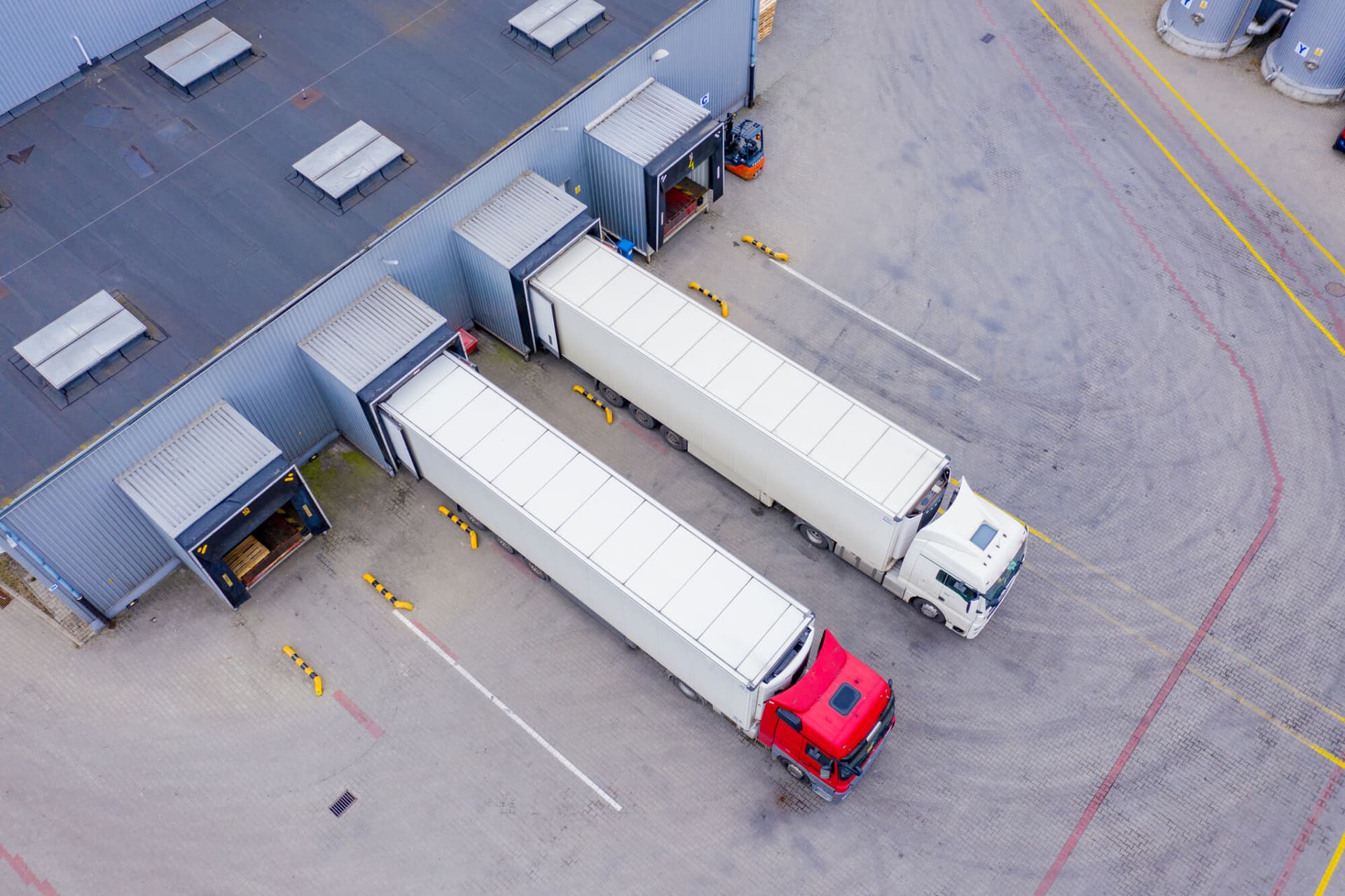 Aerial Shot of Industrial Warehouse/ Storage Building/ Loading