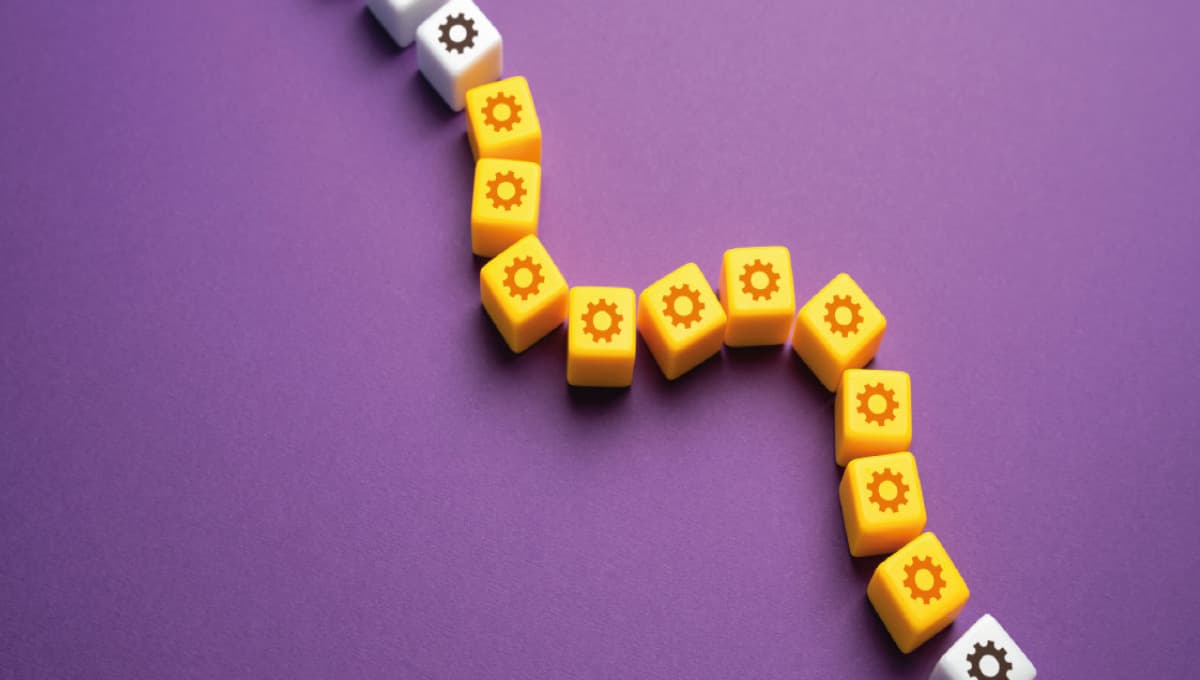 Image of blocks with pictures of cogs.