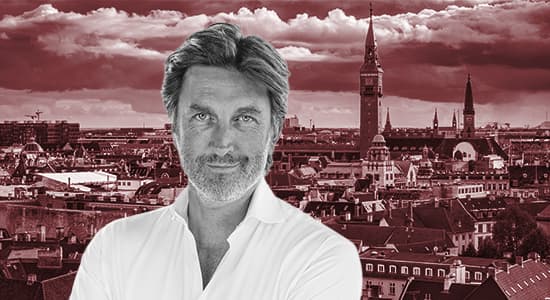 Klaus Mathisen on background of Copenhagen skyline