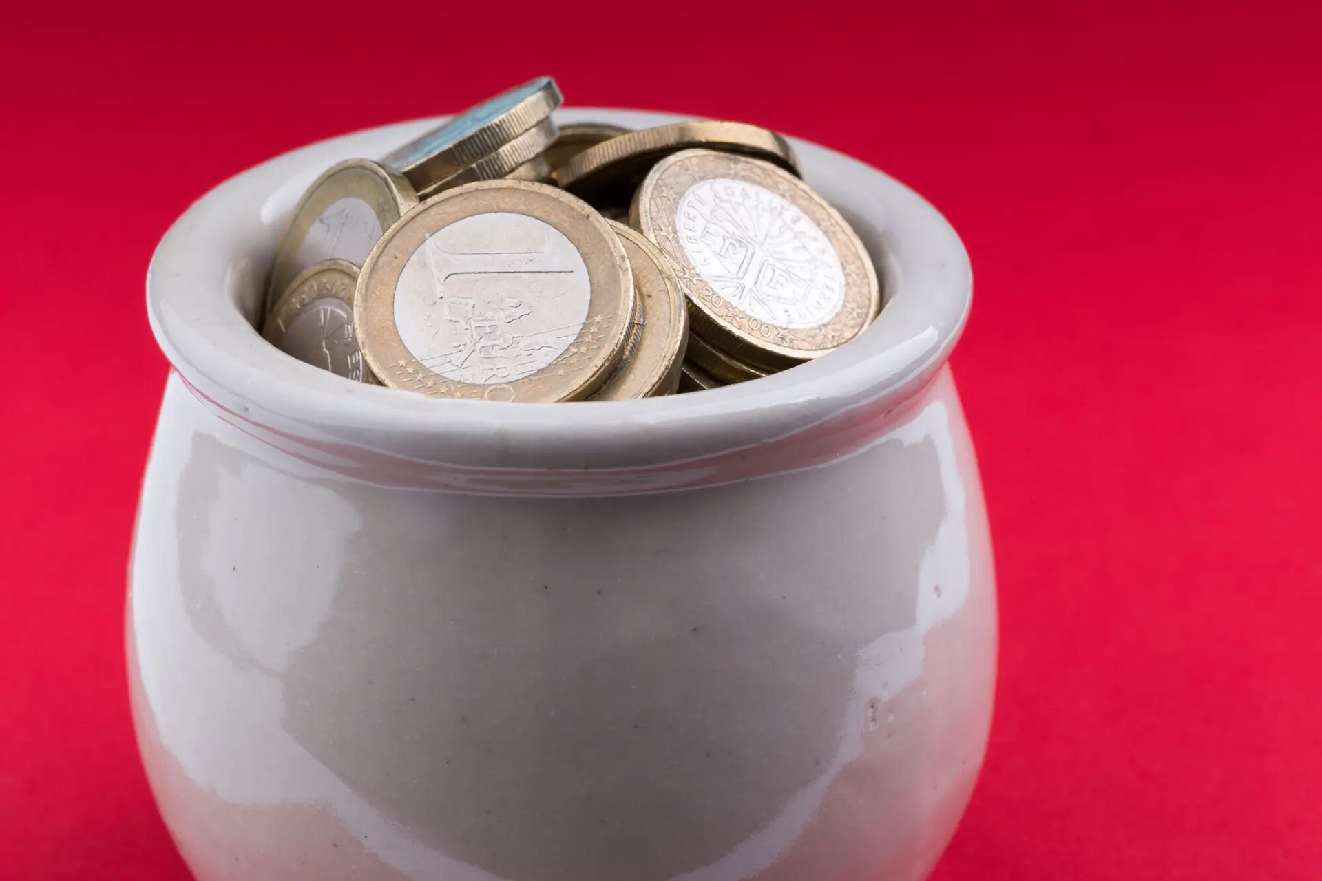 Image of a jar of coins.
